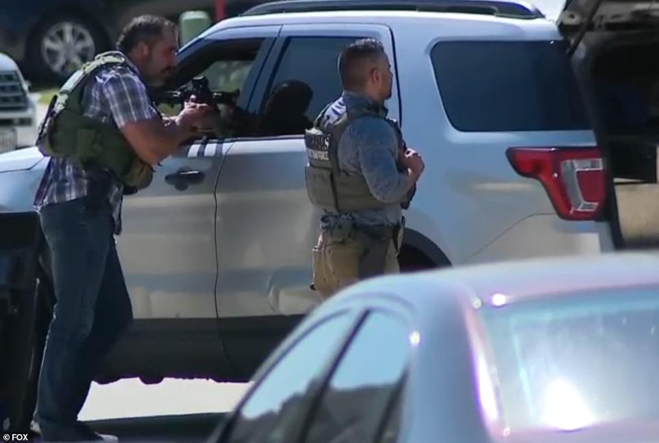 Police in Arlington were on the scene in a nearby residential area in search of the suspect on Wednesday afternoon before he turned himself in to police