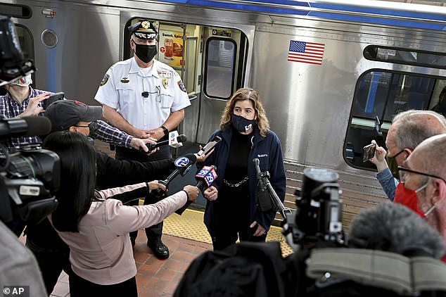 Transit officials speak at the 69th Street Transportation Center, Monday, Oct. 18, 2021, in Philadelphia, following a brutal rape on the El, as other riders watched, over the weekend