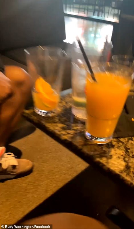The video shows several empty glasses that had presumably contained alcoholic beverages (pictured)