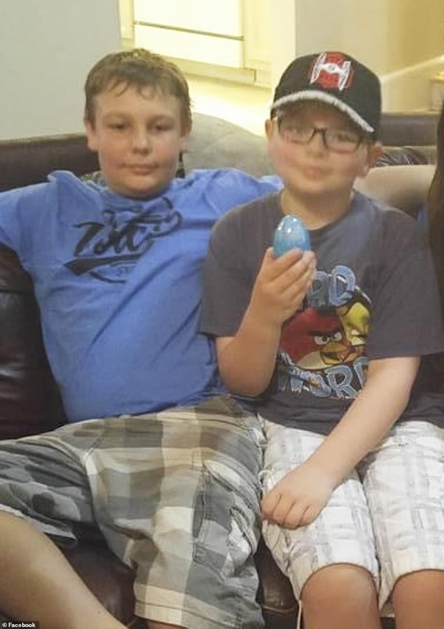 Eli, 18, (left) and Ethan, 15, (right) have the same father, but different mothers. The two boys grew up in Florida but later moved to Michigan with their dad James Crumbley and his second wife, Ethan's mom, Jennifer