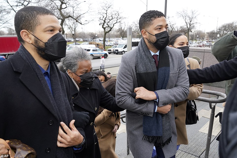Jussie Smollett took the stand in his criminal trial Monday in Chicago. Here, he's seen entering Leighton Criminal Courthouse alongside family and attorney